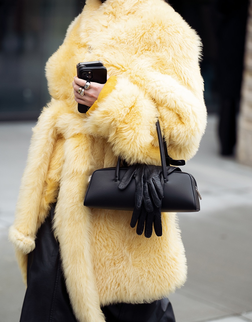 Woman wearing yellow faux fur coat | ASOS Style Feed