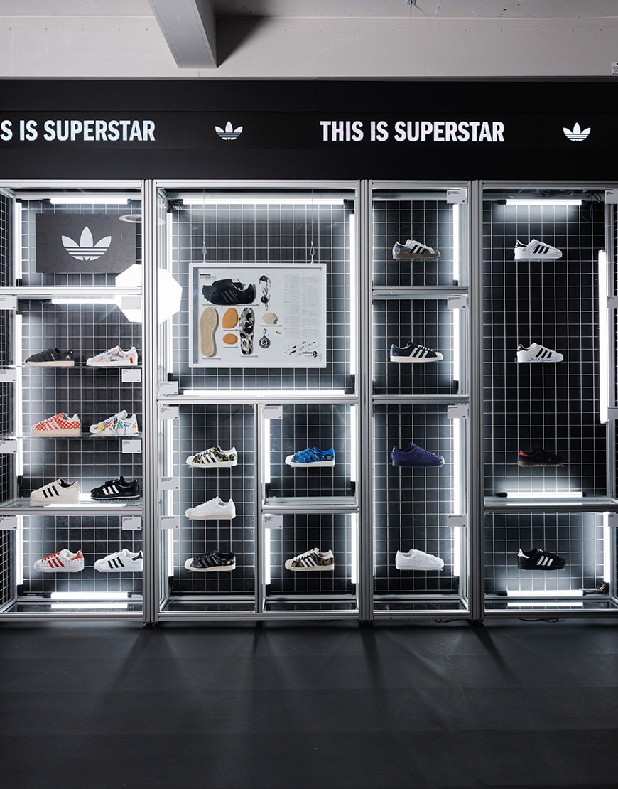 Wall of Adidas Superstar trainers