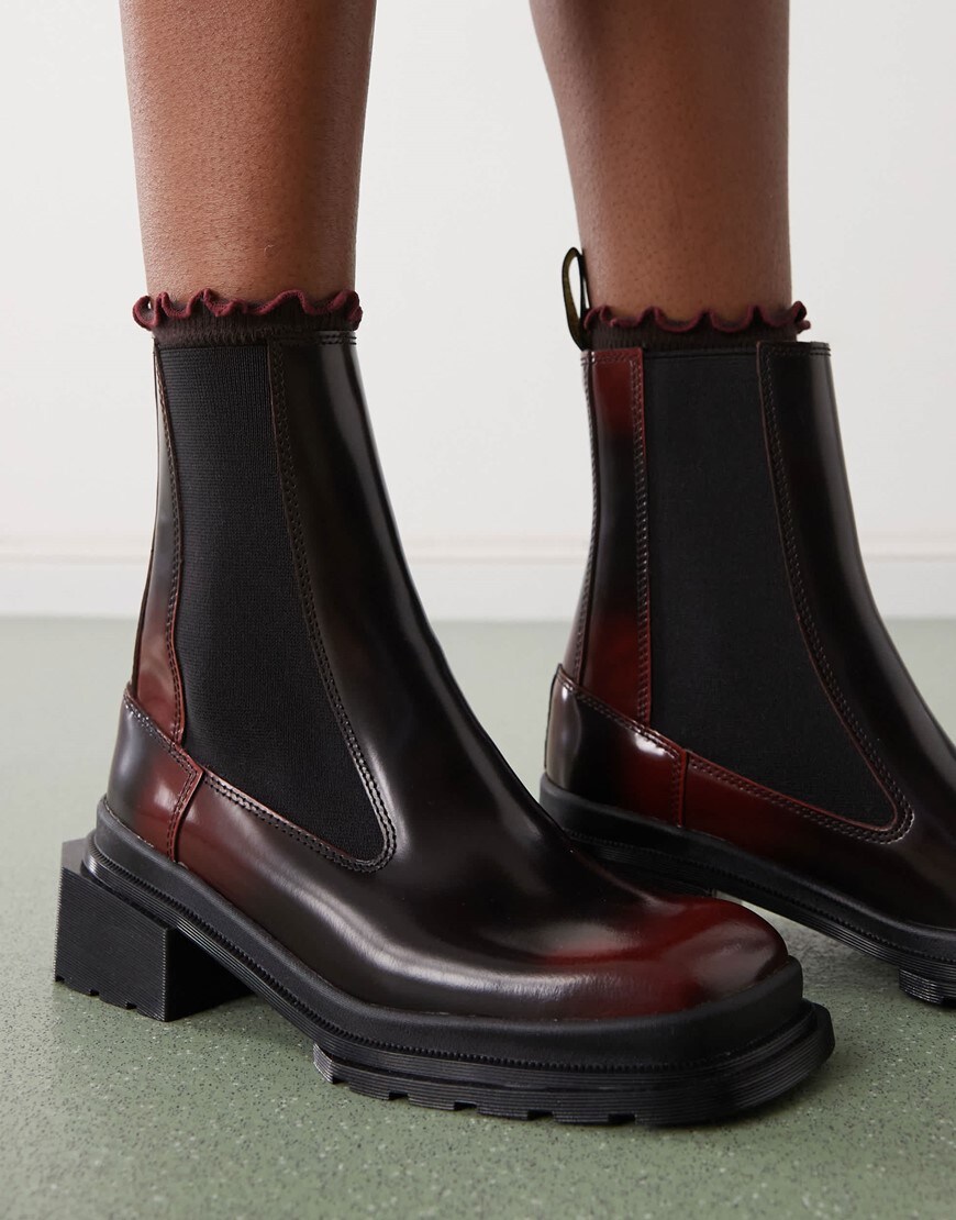 Woman wearing Chelsea boots