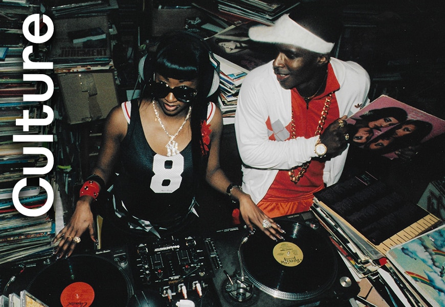 Man and woman in the 90s DJing