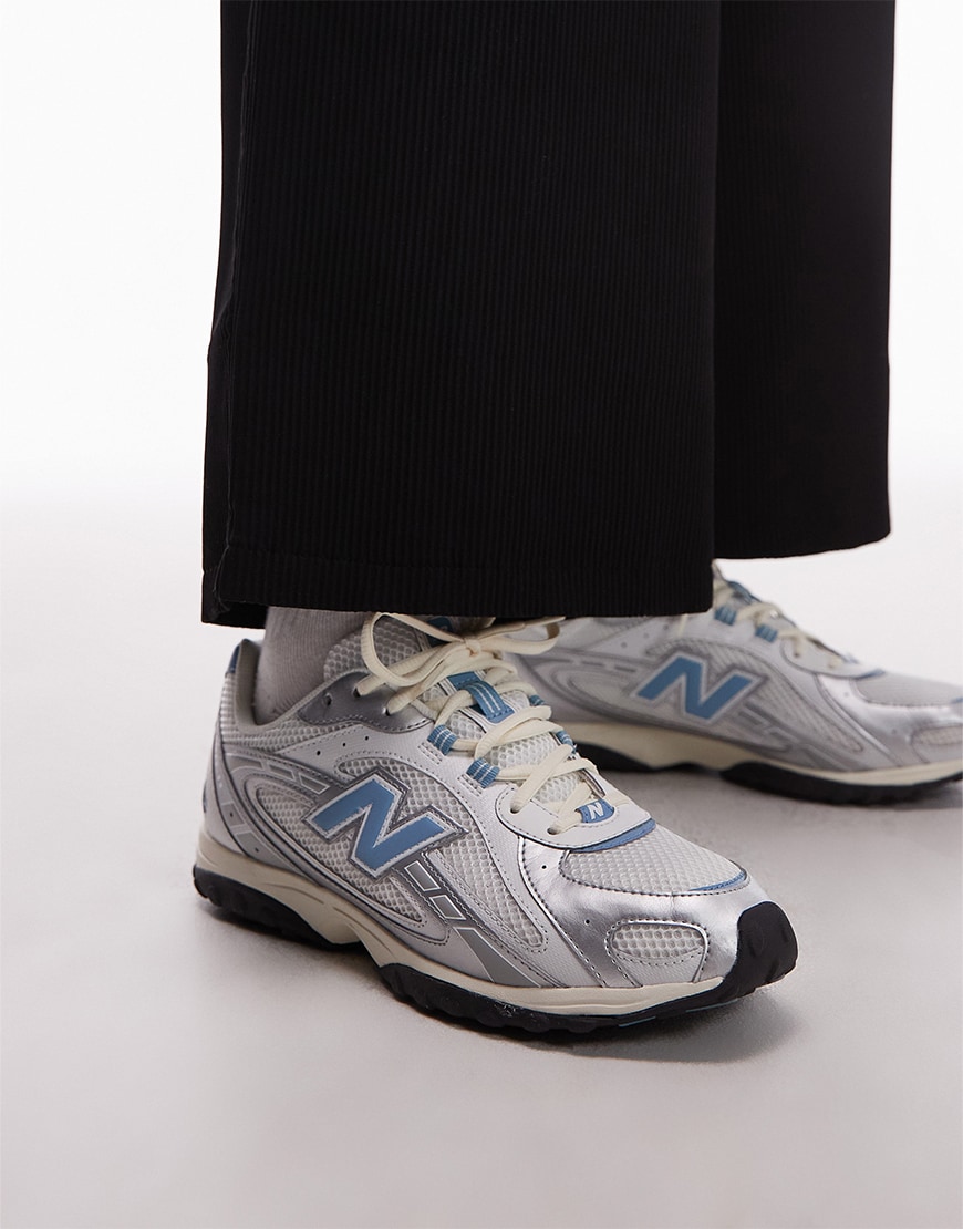 New Balance 204L trainers in blue and silver
