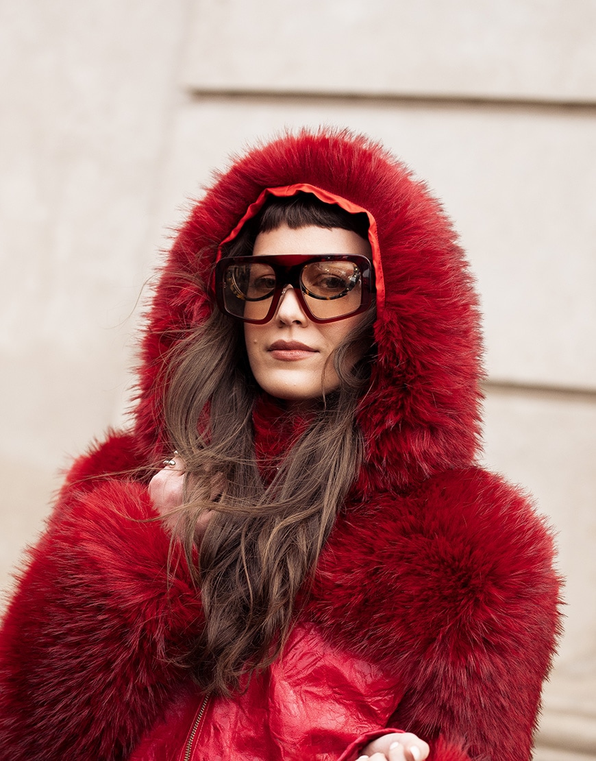 Woman wearing oversized sunglasses and faux fur coat | ASOS Style Feed