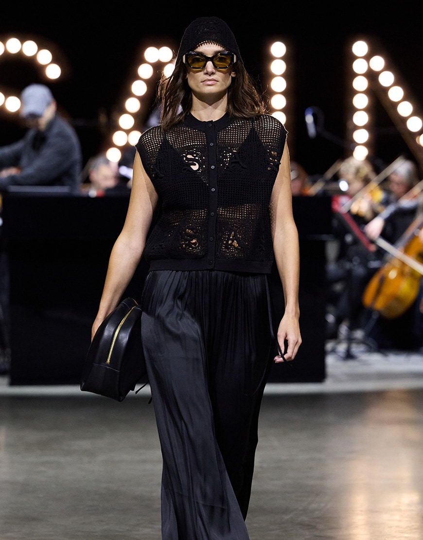 Woman wearing AllSaints black crochet hat and top | ASOS Style Feed