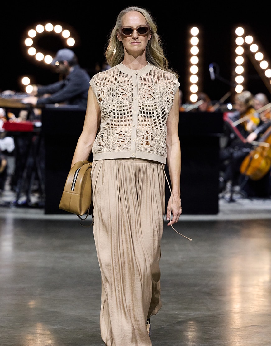 Woman wearing AllSaints crochet jumpsuit | ASOS Style Feed