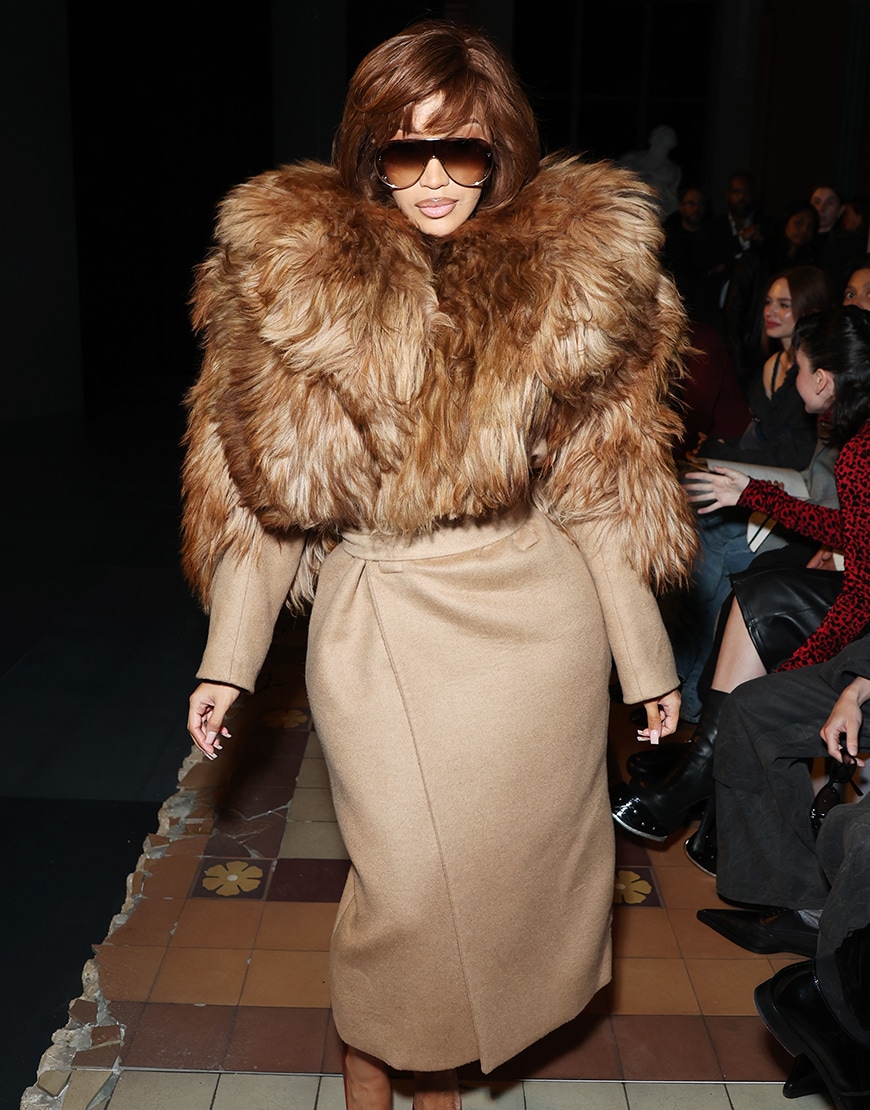 Cardi B wearing a tan faux-fur coat