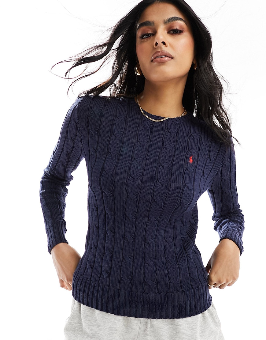 Woman wearing a navy knit jumper