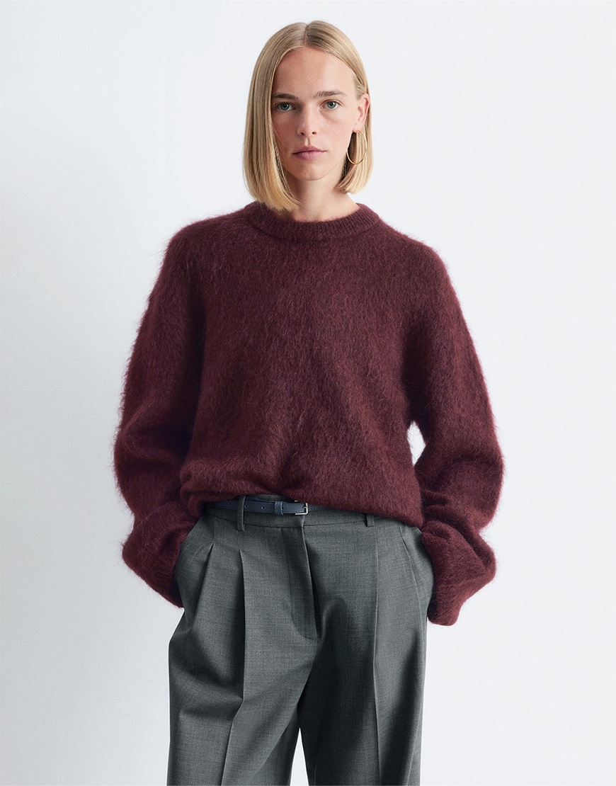 Model wearing a burgundy mohair jumper