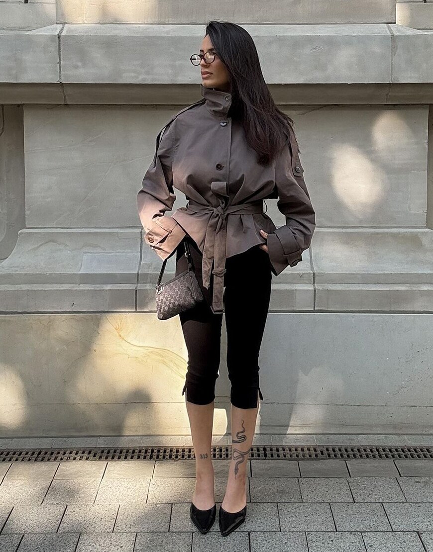 Woman wearing a trench coat