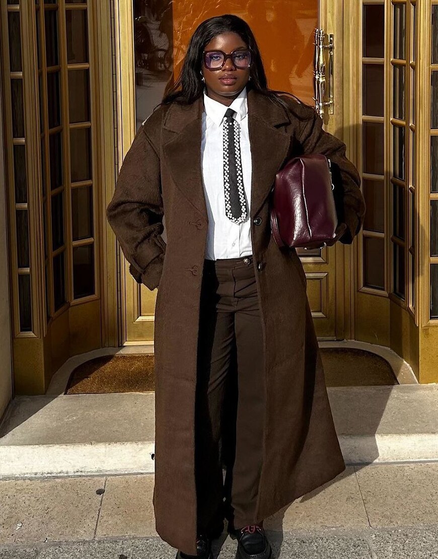 Woman wearing a brown jacket