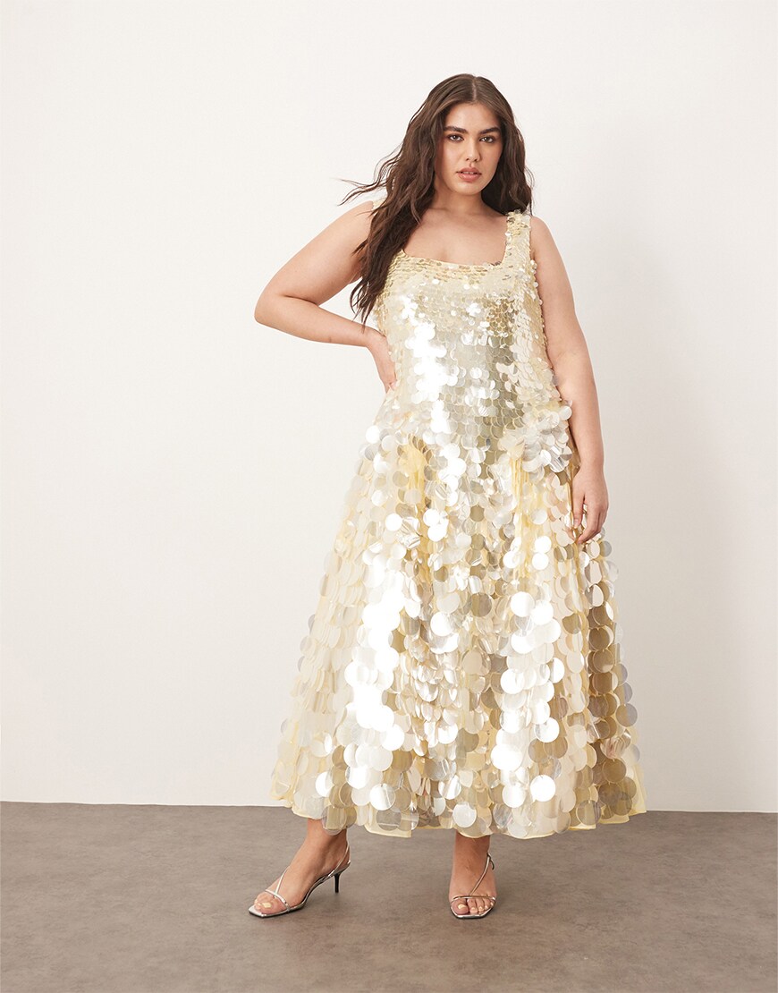 Model wearing a gold sequin dress