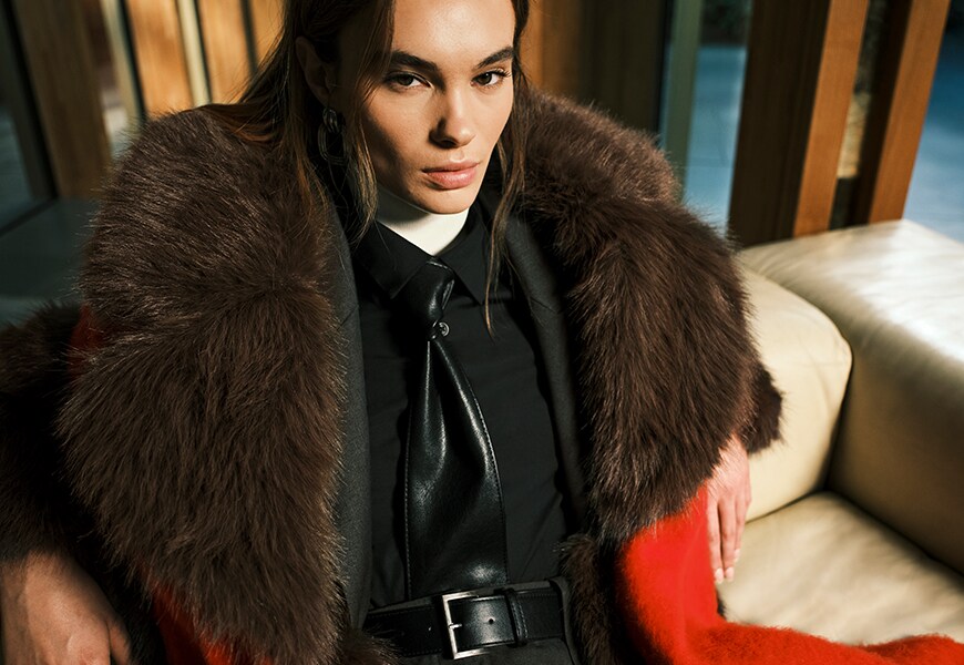 Woman wearing a faux-fur jacket