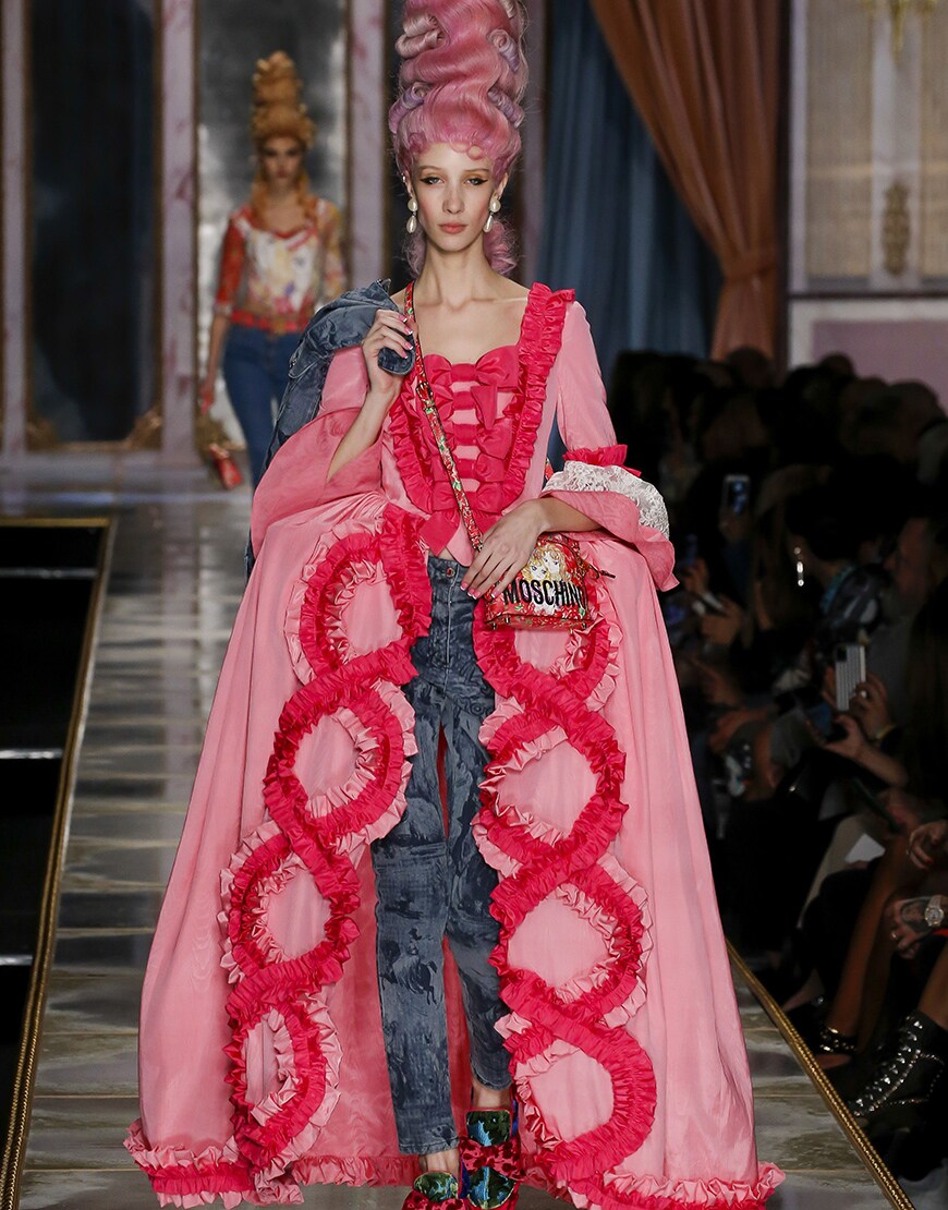 Woman wearing pink dress at Moschino runway | ASOS Style Feed