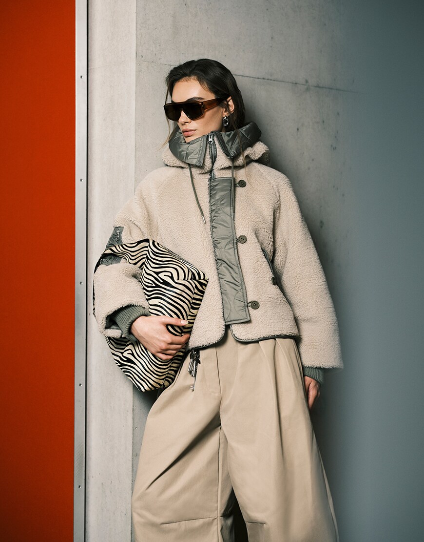 Model wearing a fleece Borg jacket