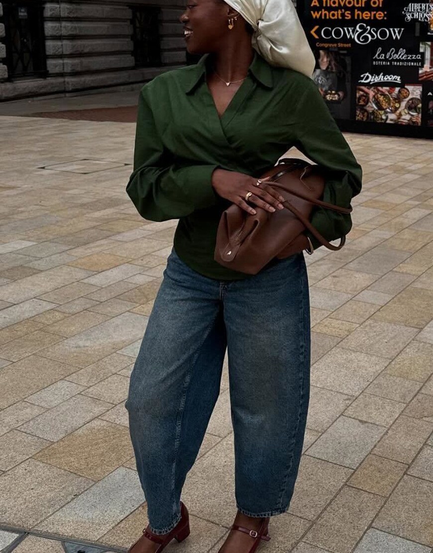 Woman wearing green shirt and suede bag | ASOS Style Feed
