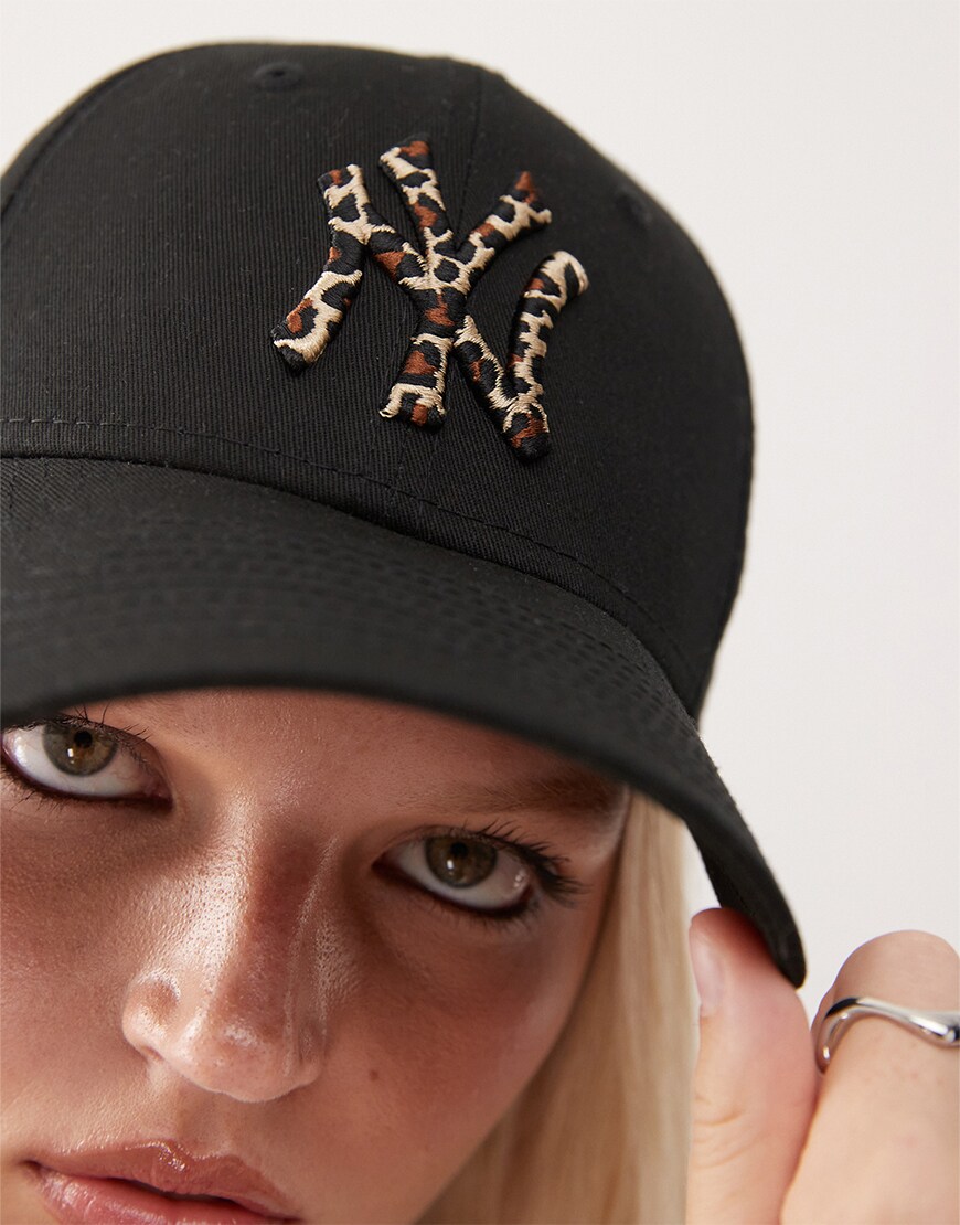 Woman wearing a black cap