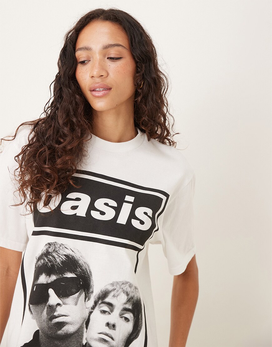 Woman wearing an Oasis band t-shirt