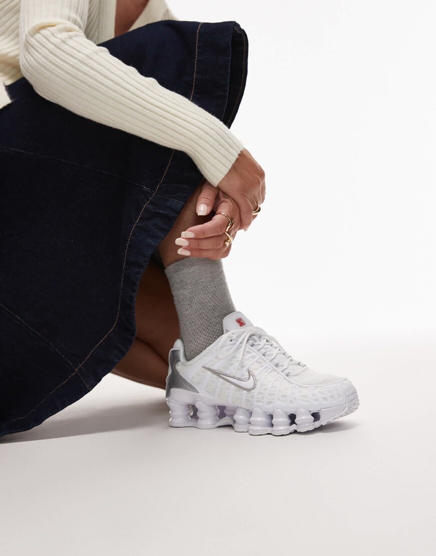 A woman wearing a velvet black and white dress | ASOS Style Feed