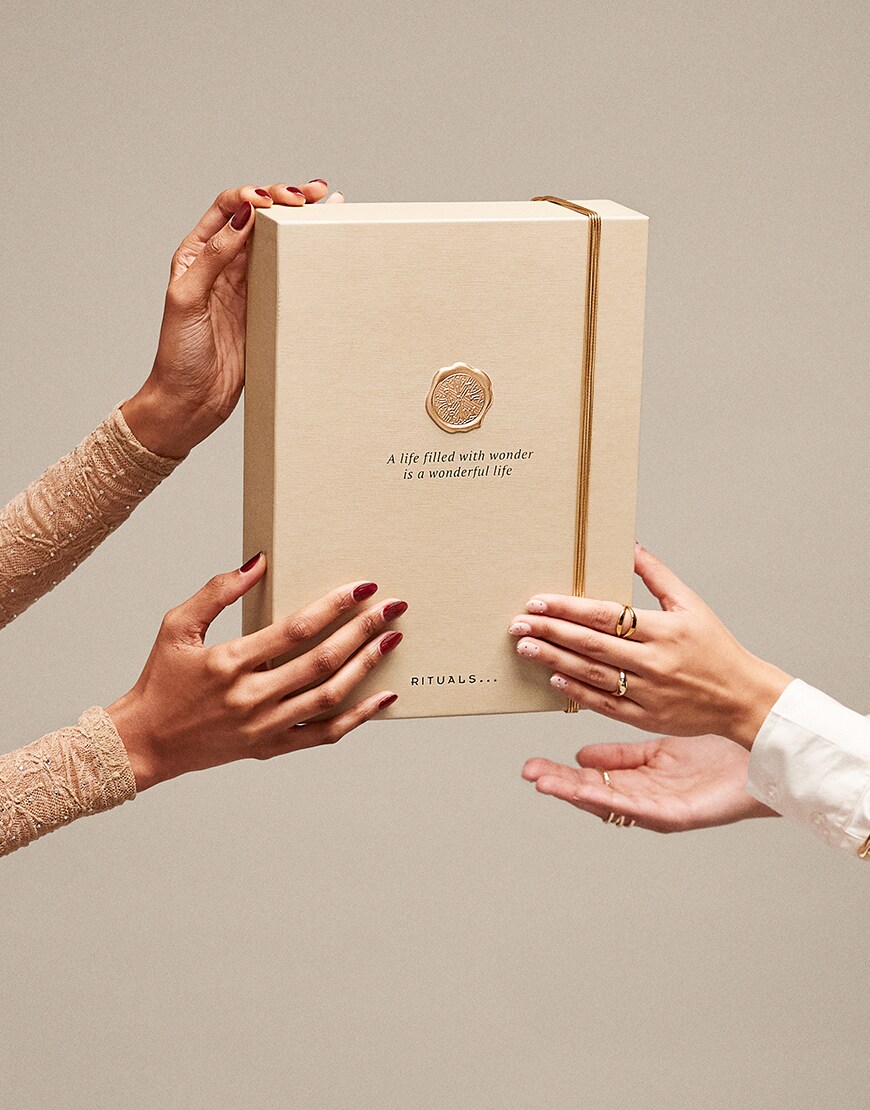 Hands holding Rituals home gift set | ASOS Style Feed