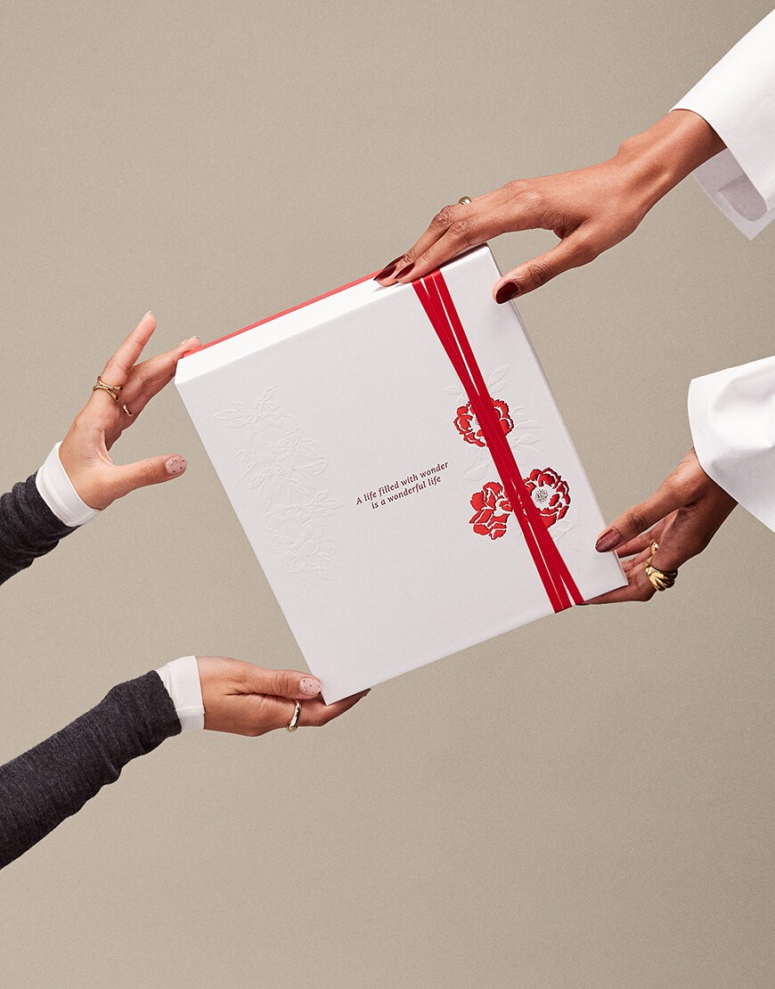 Hands holding Rituals skincare gift set | ASOS Style Feed