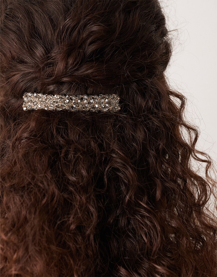 Rhinestone barette in brunette hair