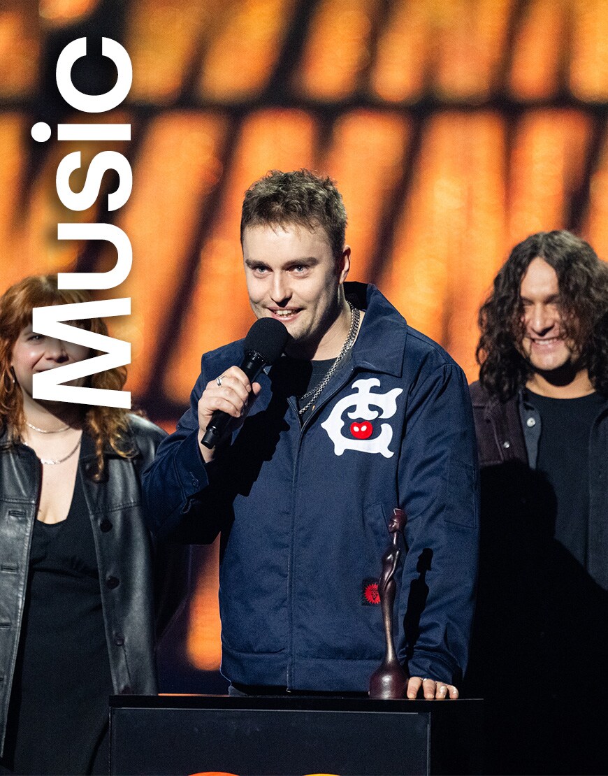 Sam Fender wearing ICE CREAM navy jacket at the BRITs | ASOS Style Feed