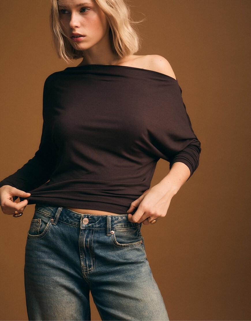 Woman Wearing Brown Asymmetric Top
