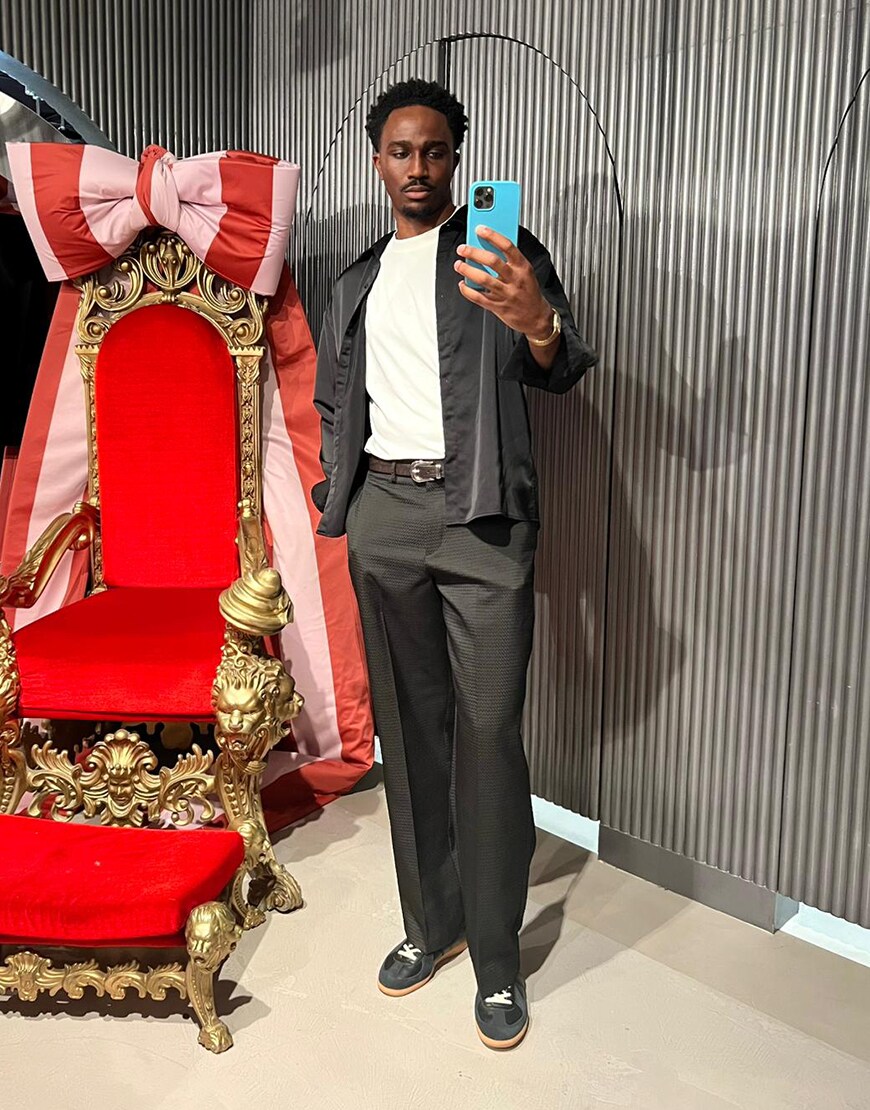 Man wearing black shirt and tailored trousers | ASOS Style Feed