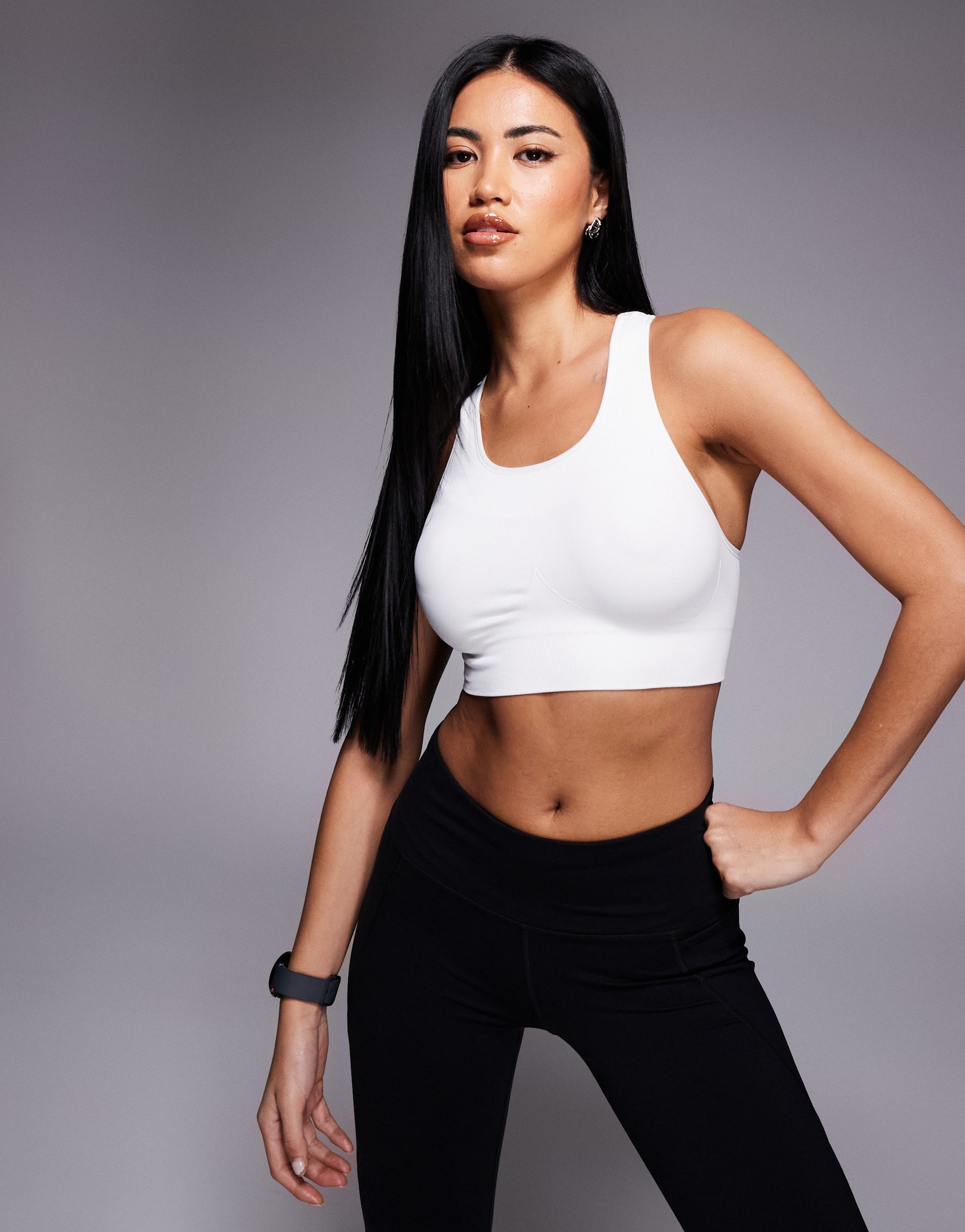 Woman wearing white Sweaty Betty sports bra | ASOS Style Feed
