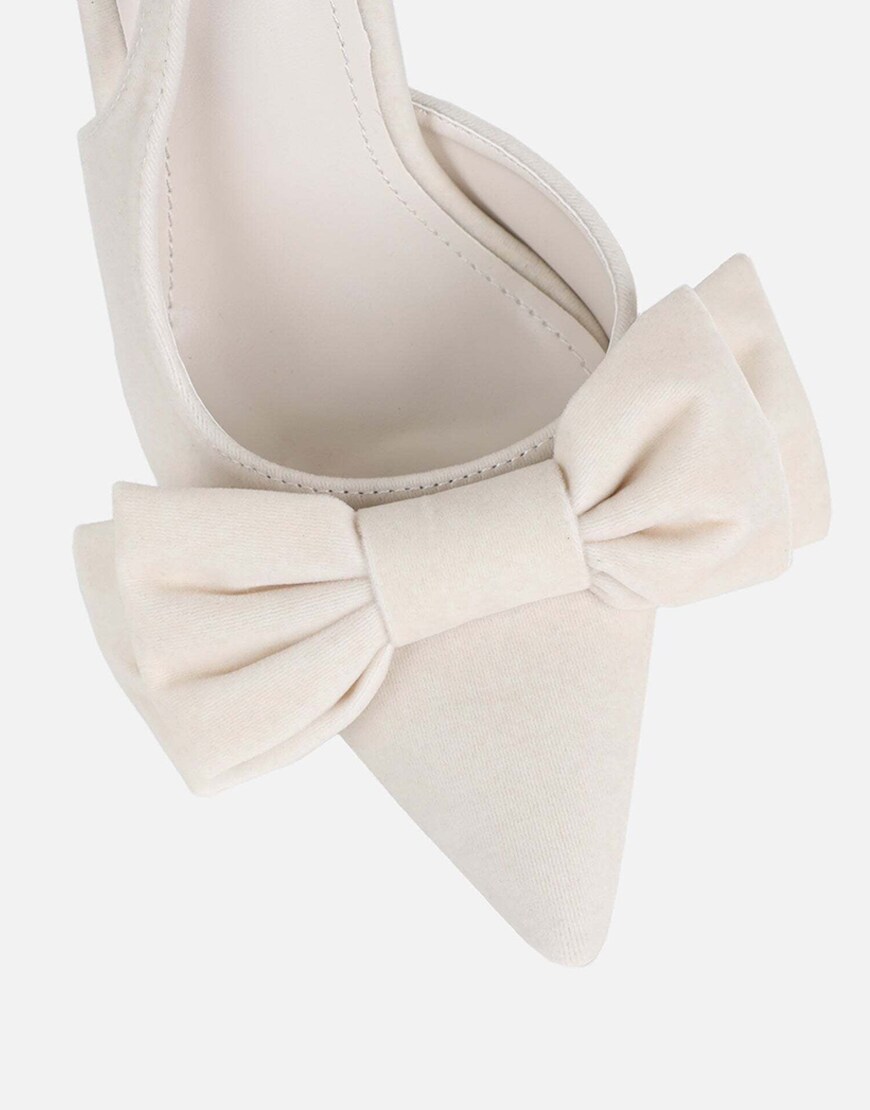 Cream heels with a bow