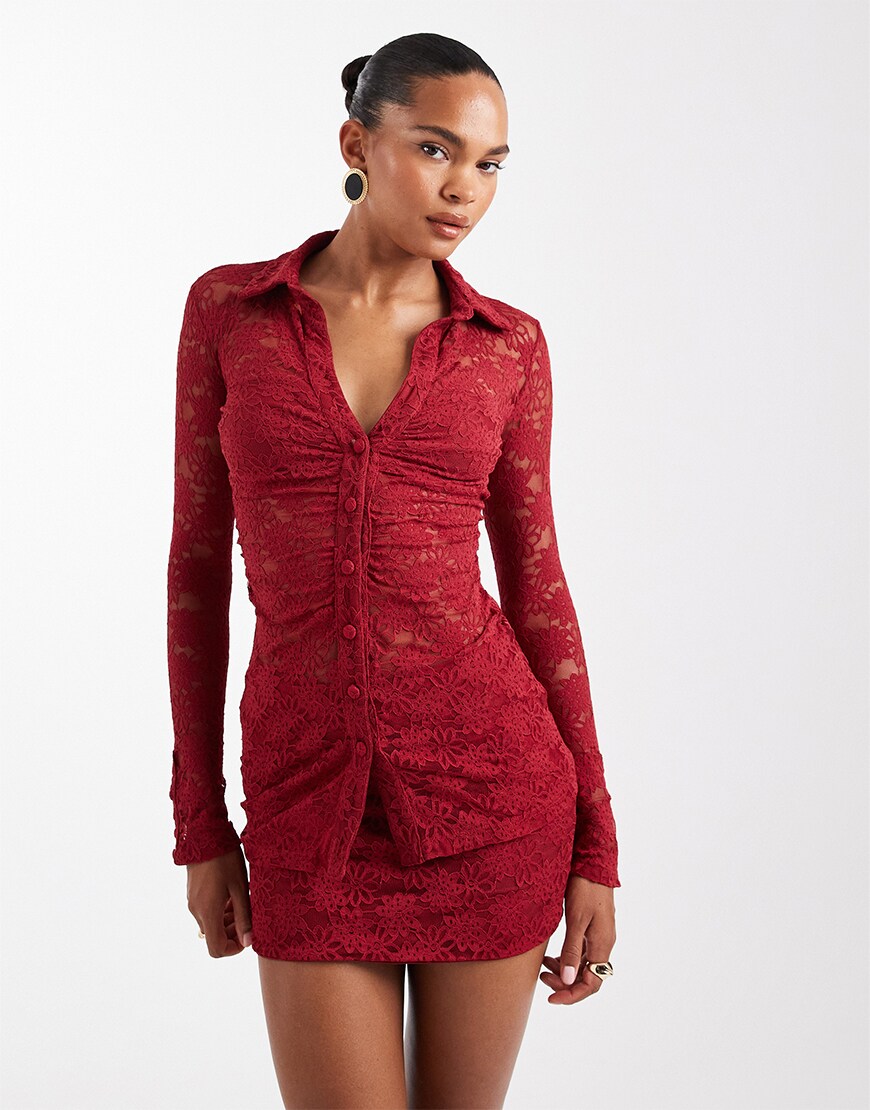 Woman wearing a red lace co-ord
