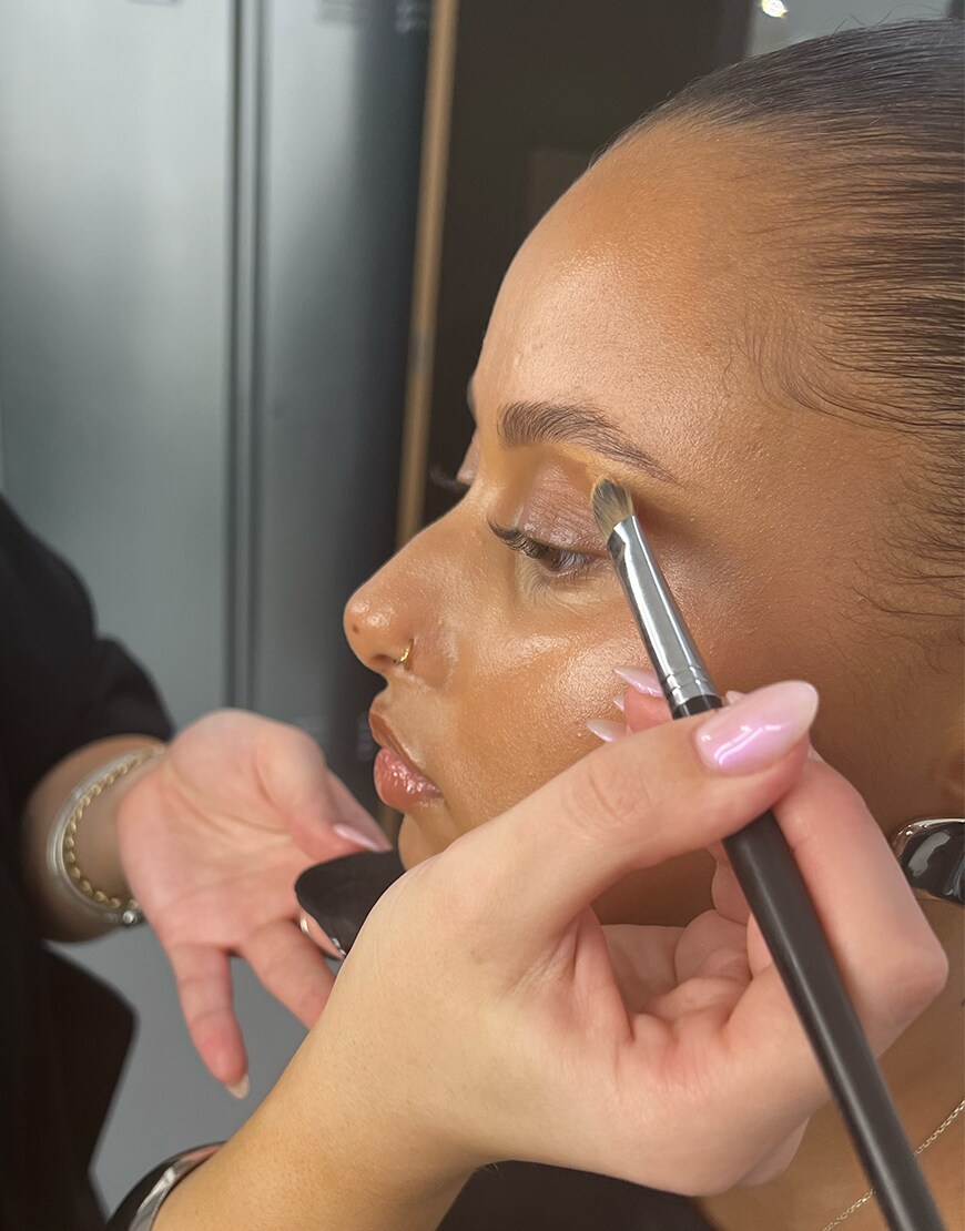 Woman getting her makeup done