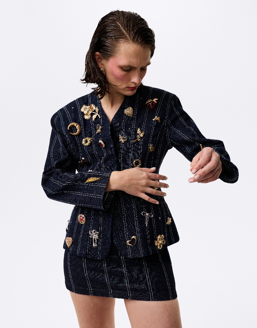 Woman wearing ASOS striped co-ord with brooches | ASOS Style Feed