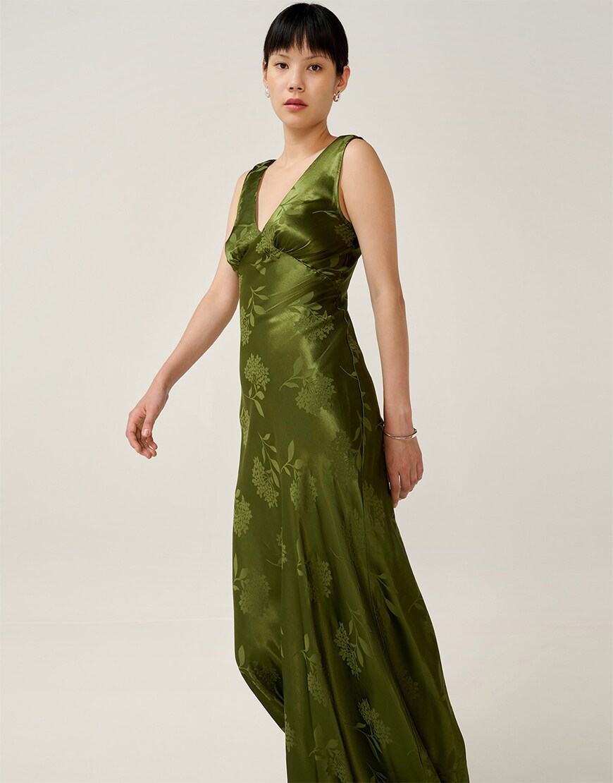 Woman wearing a green slip dress