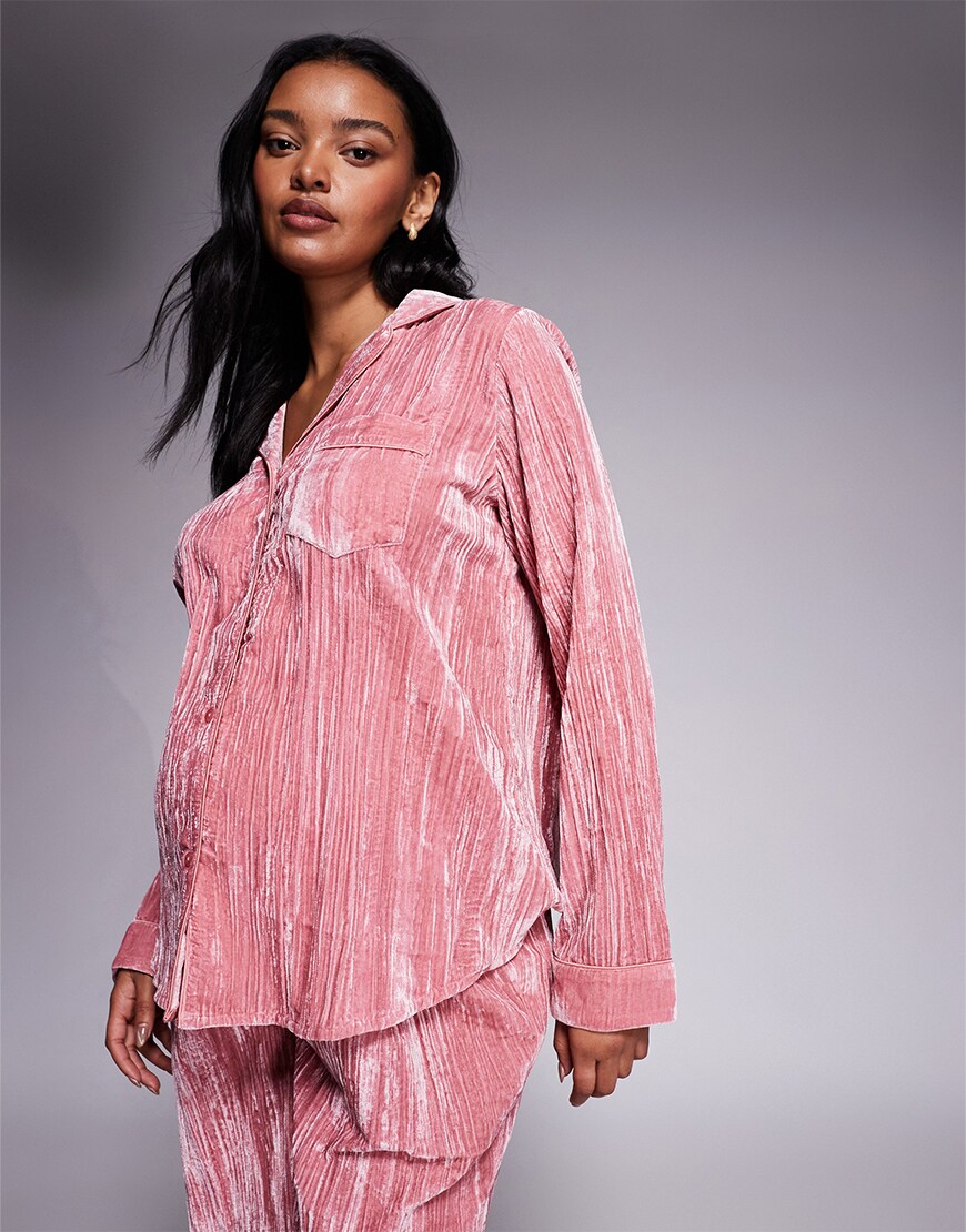 Woman wearing pink pyjamas
