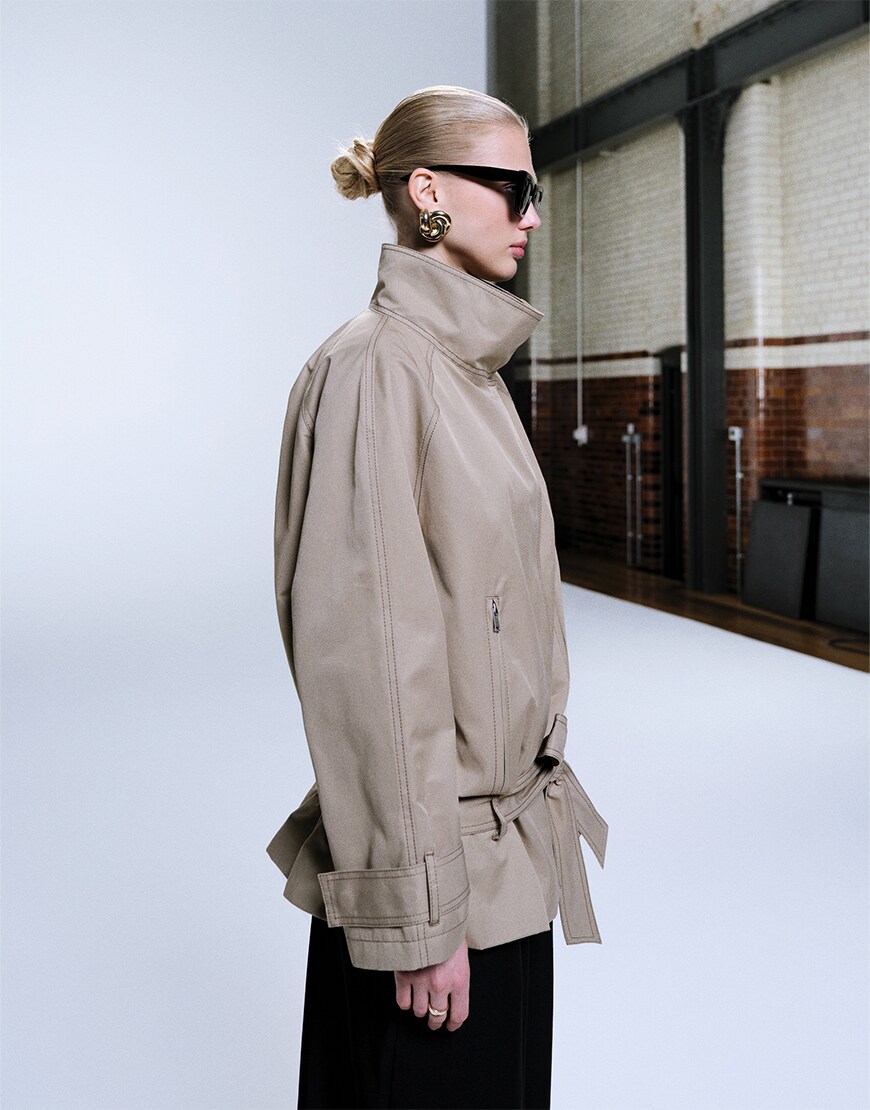 Woman wearing a trench coat
