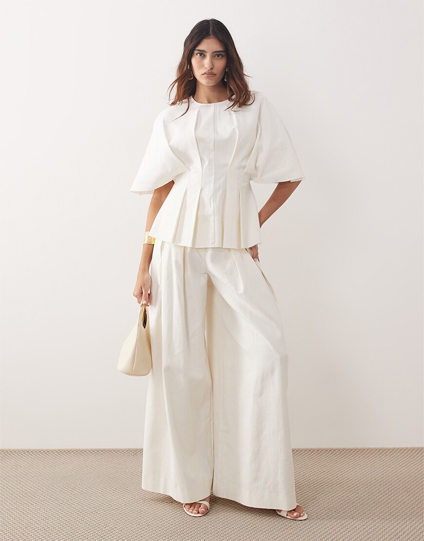 Woman wearing a white co-ord