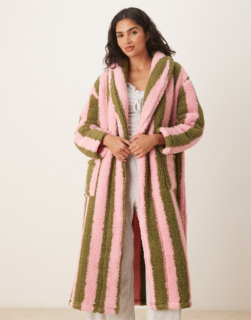 Woman wearing a striped robe