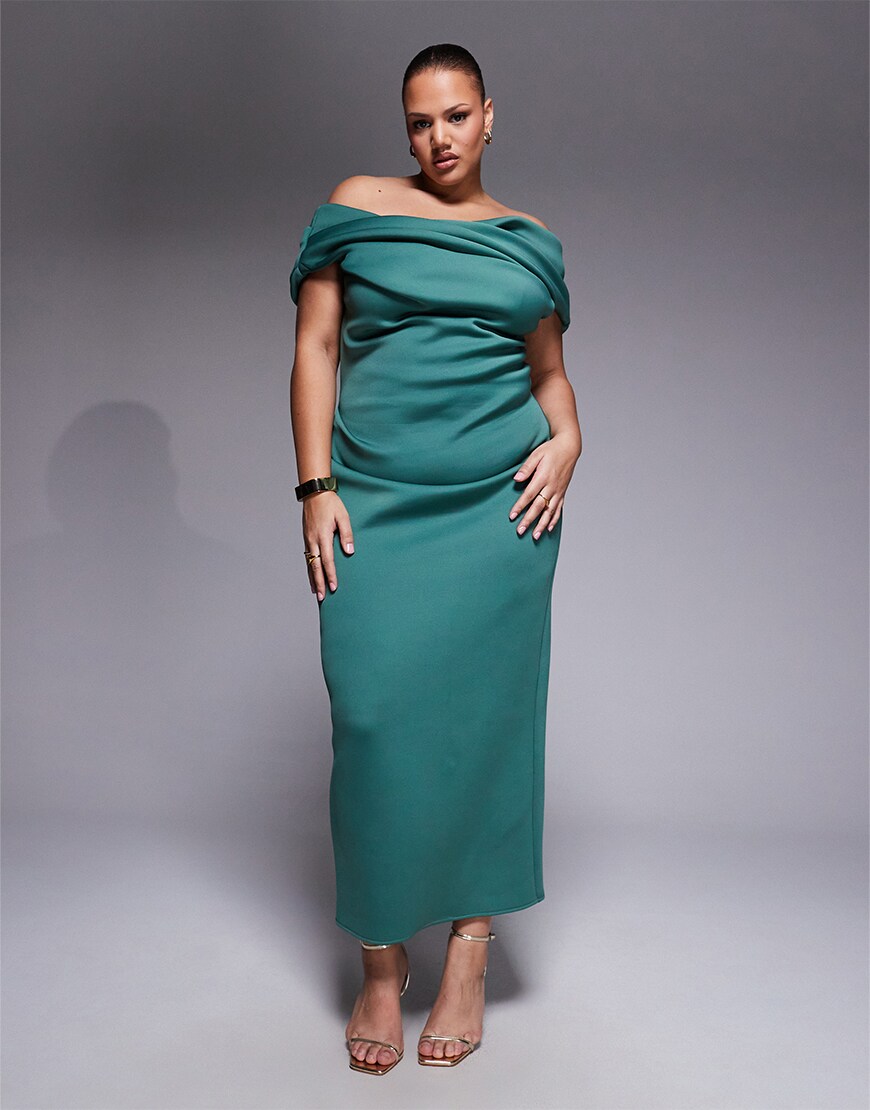 Woman wearing a teal maxi dress