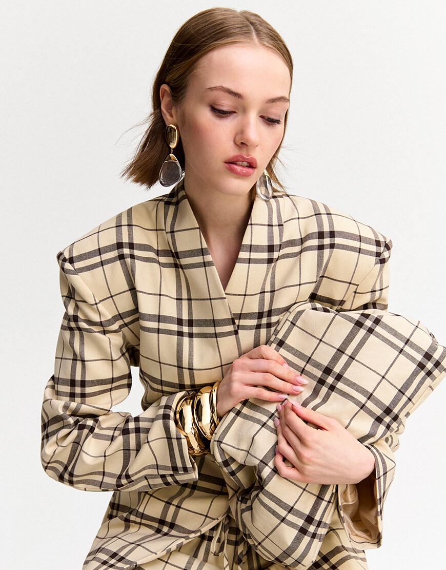 Woman wearing a checkered co-ord