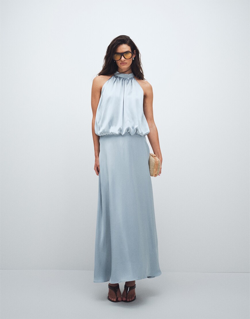 Woman wearing a blue maxi dress