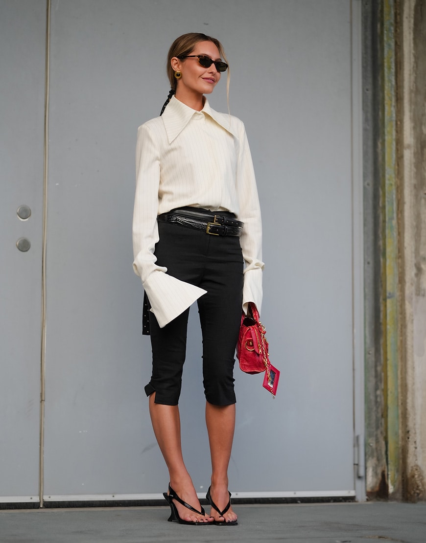 Woman wearing capris and white jacket with flip flops | ASOS Style Feed