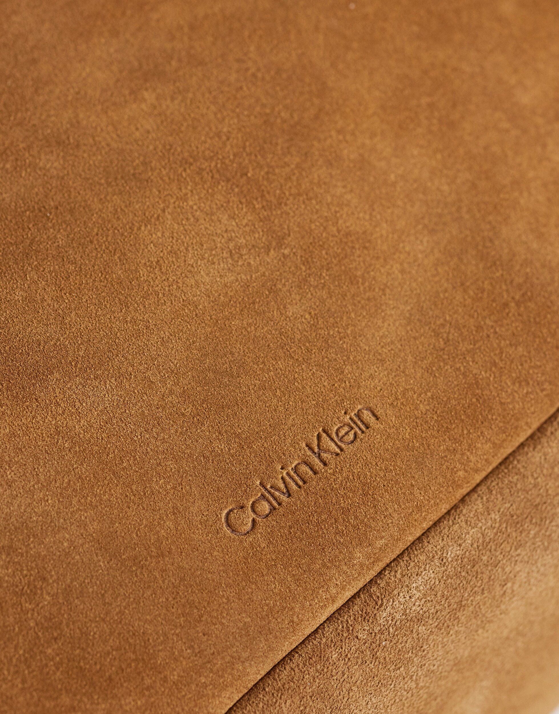 Calvin Klein Jeans medium slouchy suede bag in brown | ASOS Style Feed