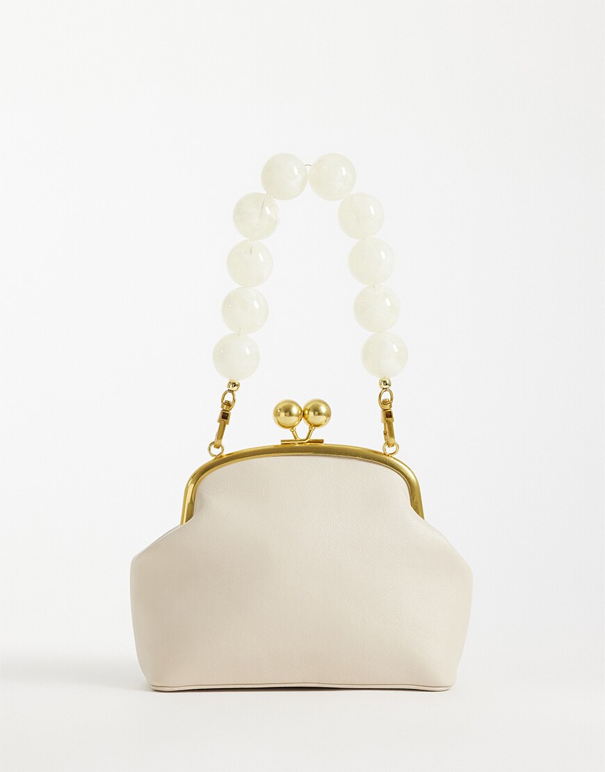 White bag with pearl strap