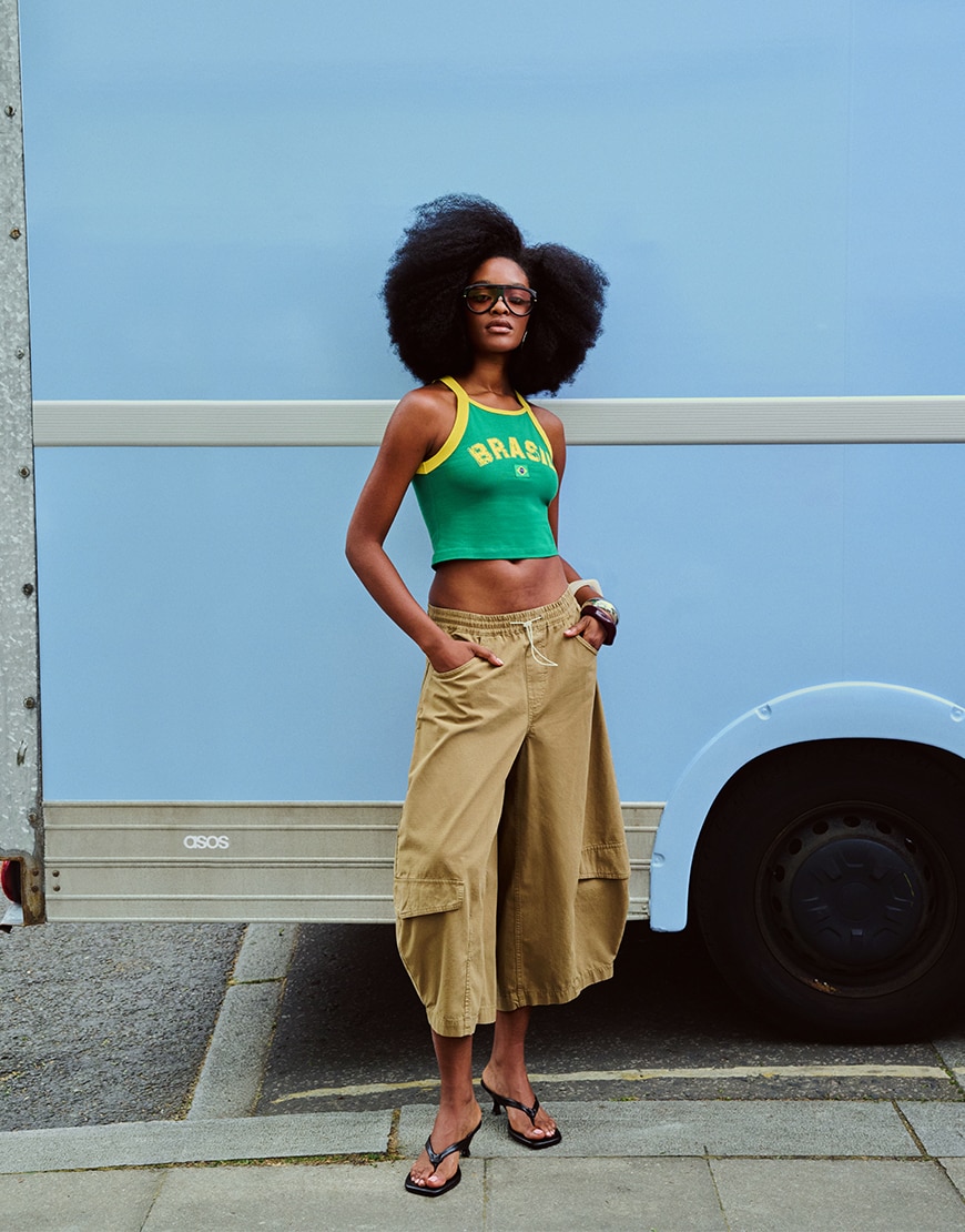 Woman wearing a 'Brazil' tank top