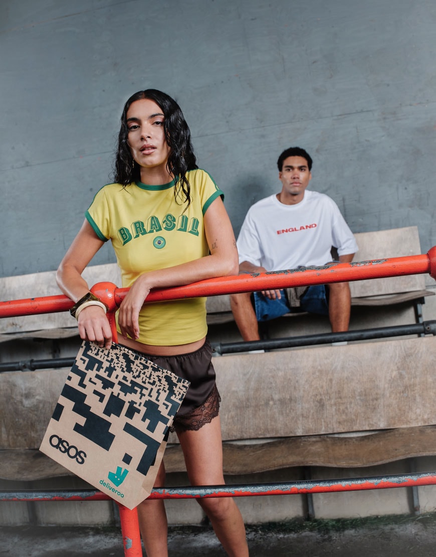 Woman and man with a football