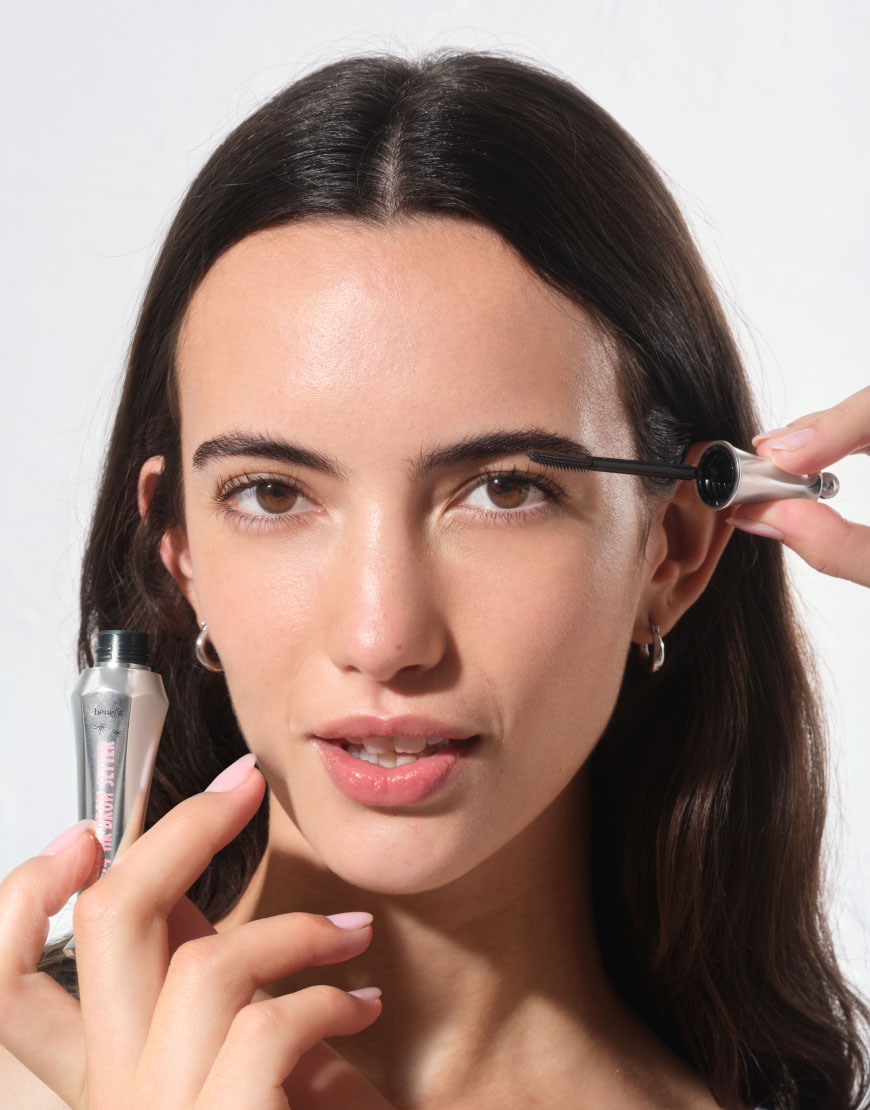Woman posing with the Benefit brow gel