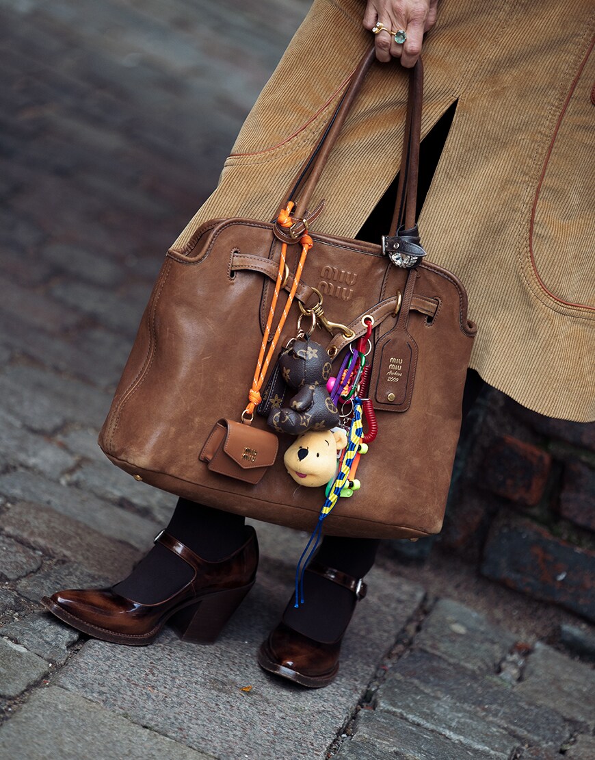 Brown bag with charms