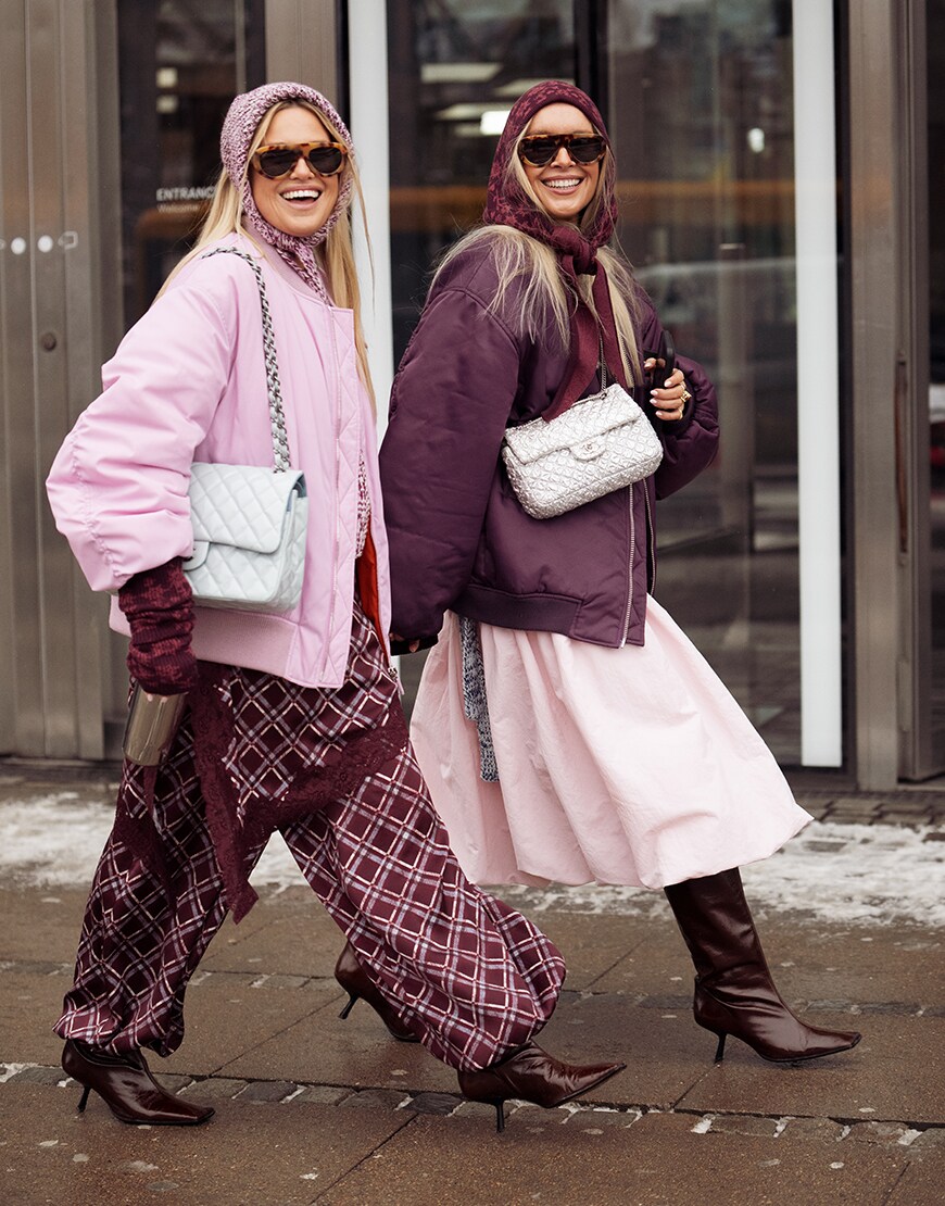 Women wearing pink and purple outfits