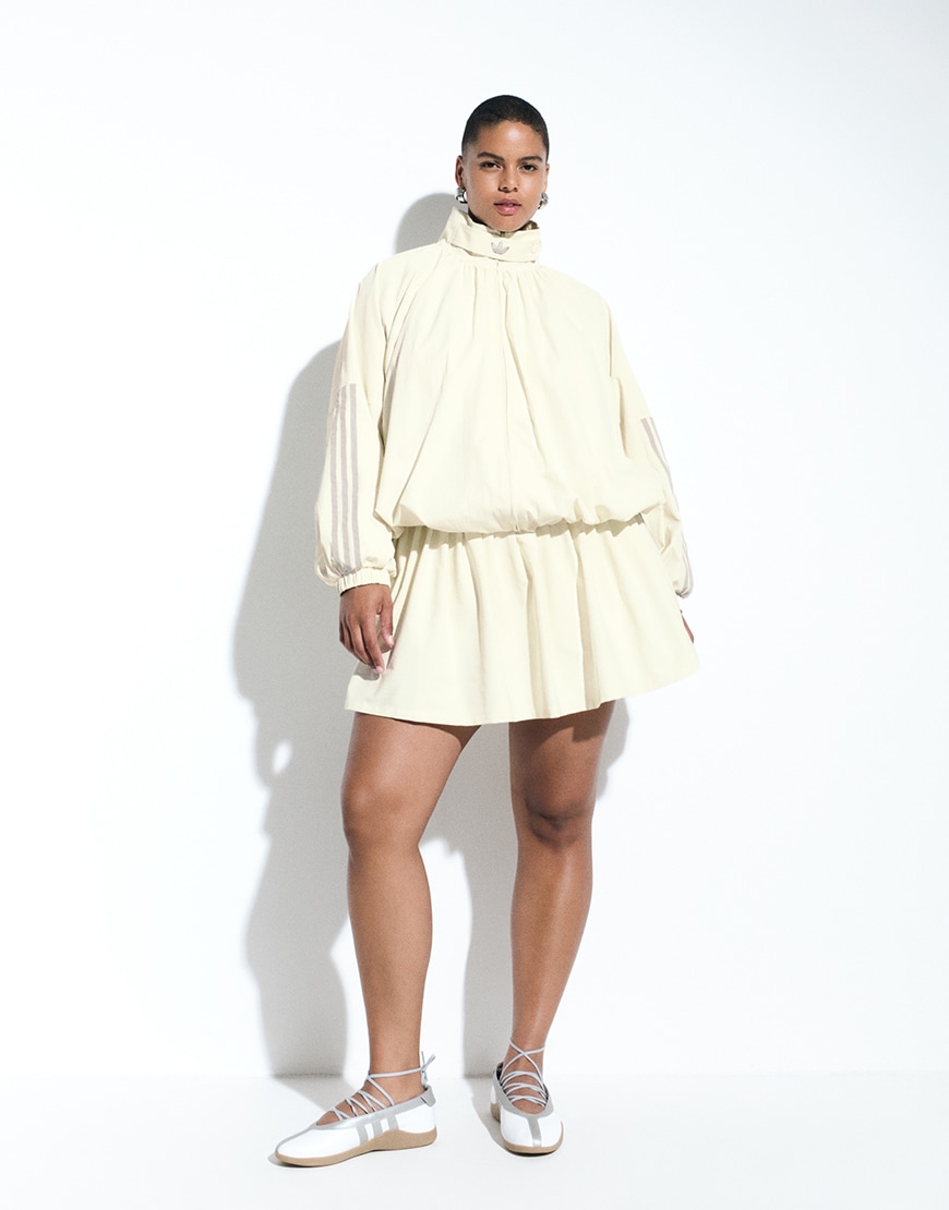 Model wearing butter yellow adidas jacket and skirt | ASOS Style Feed