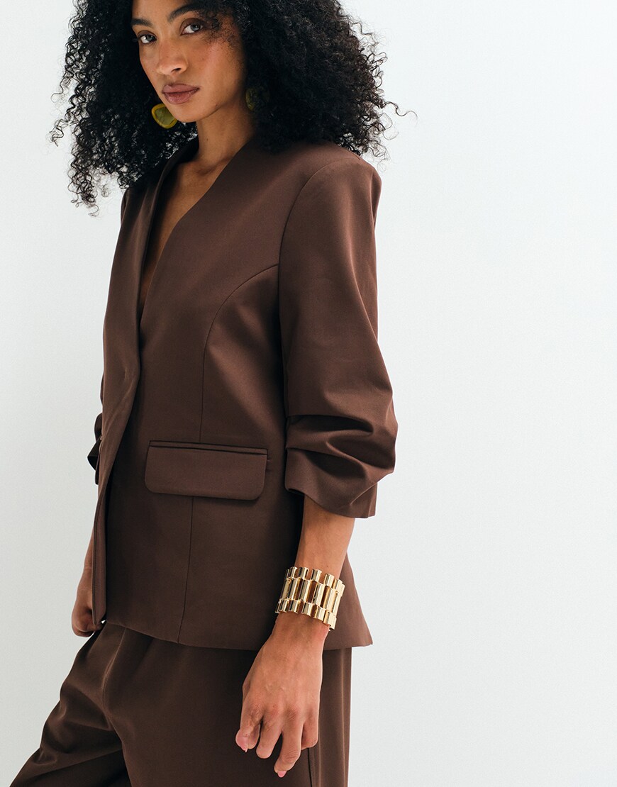 Woman wearing ASOS Adaptive collarless blazer | ASOS Style Feed
